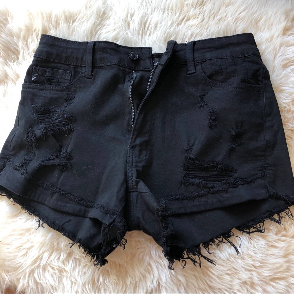 Black ripped shorts
